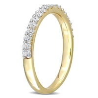 Jubilarni prsten od bijelog safira od žutog zlata od 10 karata koji je kreirala tvrtka u obliku polumjeseca.